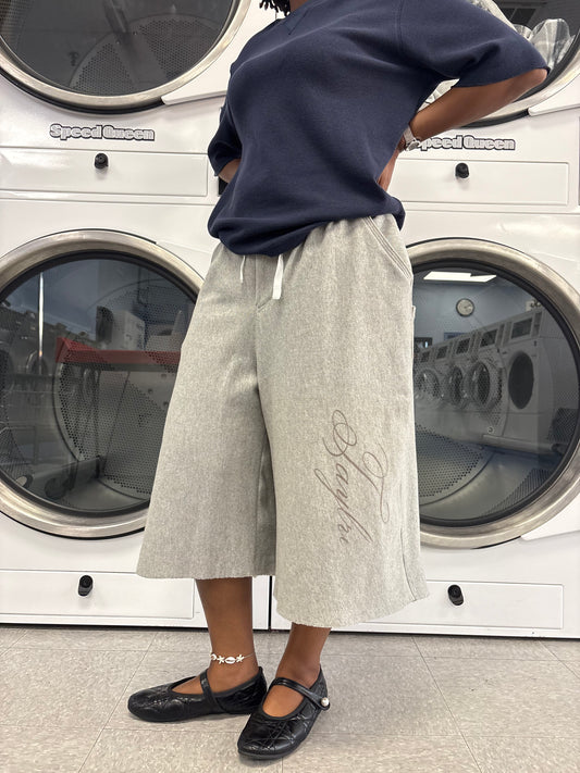 TAYLRDMADE Script Sweatshorts, front view showing tonal script branding